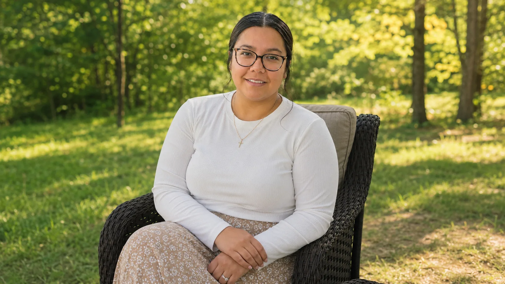 Cacie Carganilla, founder of Sixteen36 Co., seated outdoors